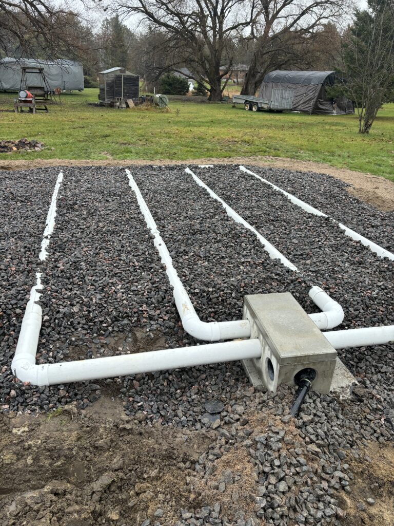 Robitaille Contracting team providing septic services at a residential property in Nipissing, Ontario