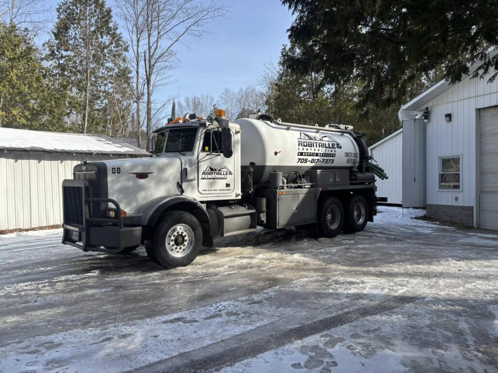 Robitaille Contracting team member speaking with a satisfied customer in Trout Creek, Astorville, or North Bay